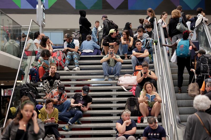 Passengers wait for their train departures at the Gare Montparnasse train station in Paris on Friday. Photograph: Thibaud/Moritz/AFP