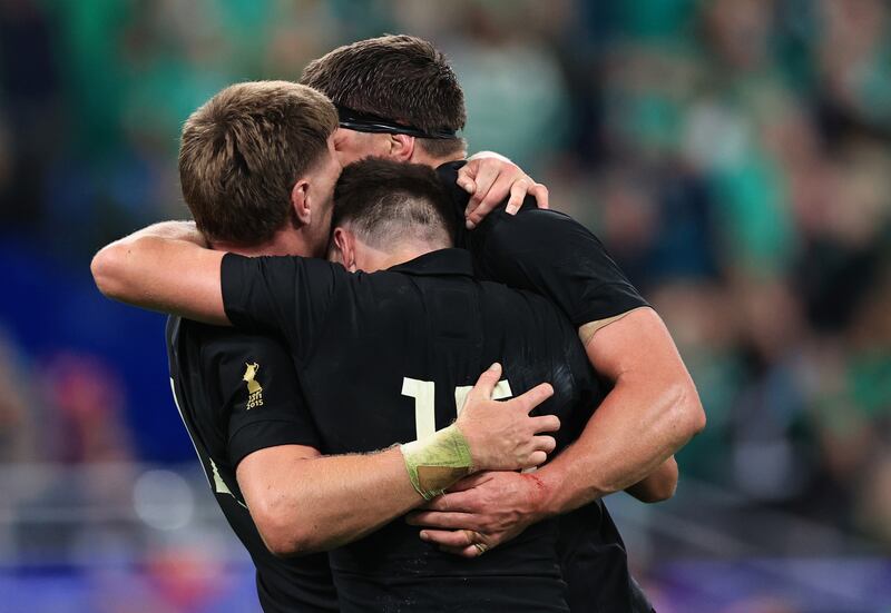 The Barrett brothers, Jordie, Scott and Beauden, celebrate after the Rugby World Cup quarter-final win over Ireland at Stade de France. Photograph: Billy Stickland/Inpho