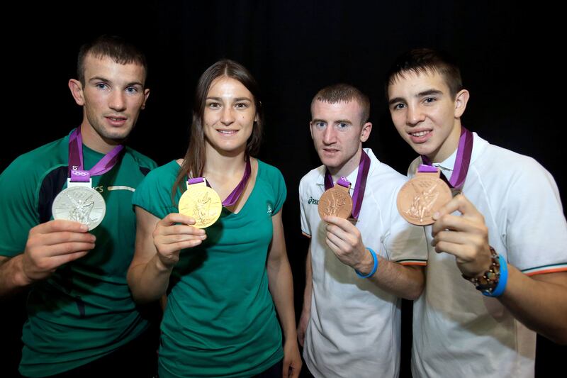 London 2012 Olympic Games, London, England 12/8/2012
Ireland's Olympic Boxing Medalists
Ireland's John Joe Nevin, Katie Taylor, Paddy Barnes and Michael Conlan show off their medals
Mandatory Credit ©INPHO/Dan Sheridan