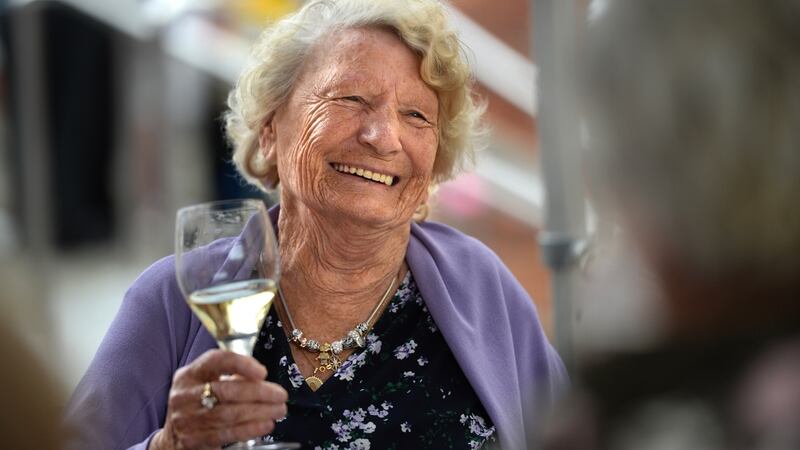 Margaret Murphy (79) enjoying celebrations as the Residents Association of Wolfe Tone Close, Dublin, organised a Fourth of July Independence Day celebration for the older residents of the complex. Photograph: Dara Mac Dónaill
