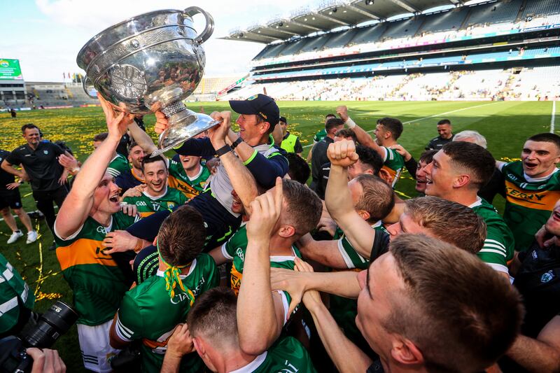 The Kerry team lift manager Jack O’Connor and celebrate with the Sam Maguire following victory over Galway in the All-Ireland final in July. Photograph: Ryan Byrne/Inpho 