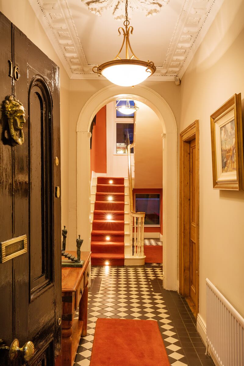 Note the lighting on the steps of the stairs: the present owner is an electrical engineer who has installed all sorts of clever lighting through the house. Photograph: Wojtek Bartkowski