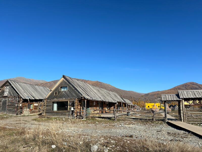 Log cabin hotels in Kanas. Photograph: Denis Staunton