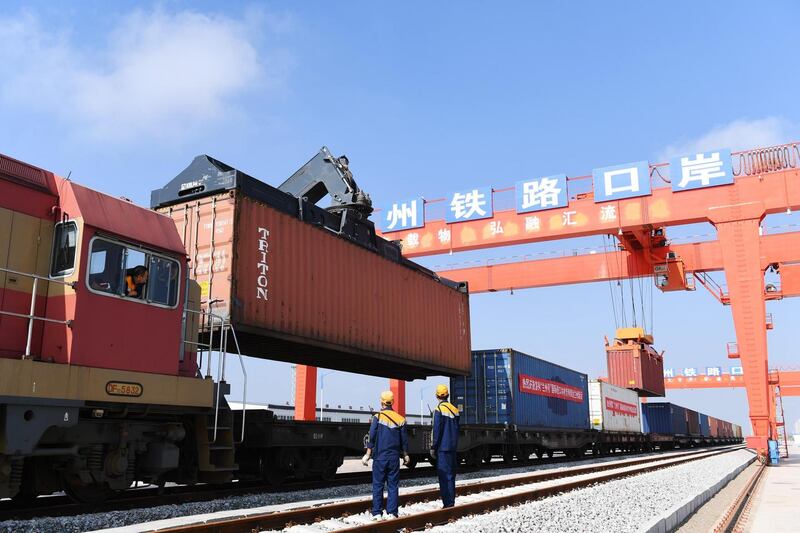 Containers are lifted from a freight train at Lanzhou New Area on August 14th, 2018 in Lanzhou, Gansu Province, China Photograph: Yang Yanmin/China News Service/VCG/Getty