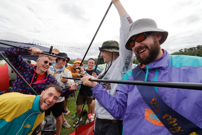 Electric Picnic 2024: a group of friends from Wexford put up their tent on Friday. Photograph: Alan Betson
