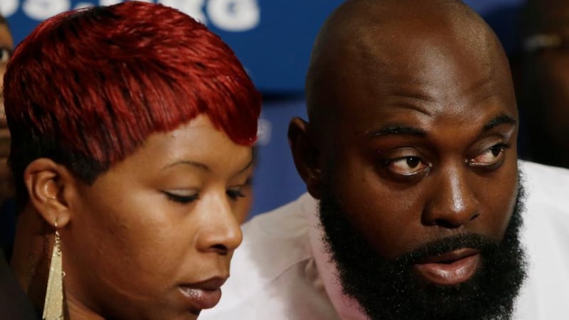 The parents of Michael Brown, Lesley McSpadden (left) and Michael Brown, Sr (right) appear at a news conference at the National Press Club in Washington. last week.  Photograph: Reuters
