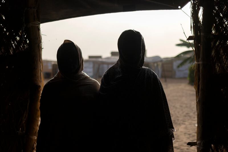 A 16-year-old girl who was raped, and her mother, at the women’s centre in the refugee camp. Photograph: Chris Maddaloni