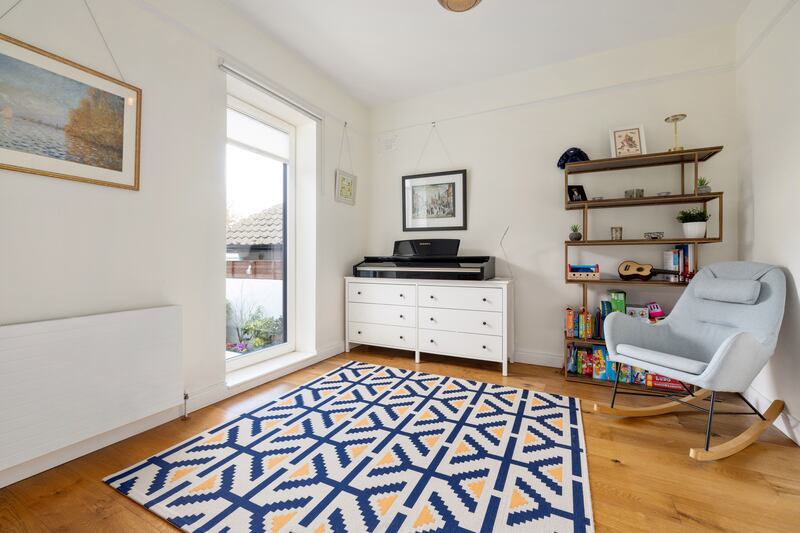 Third bedroom with Juliet balcony overlooking garden. Photograph: Andrew Nolan