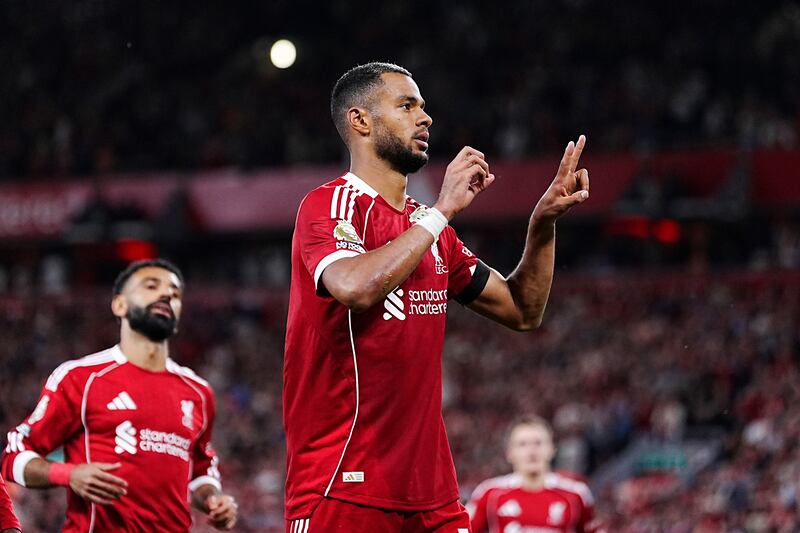 Liverpool's Cody Gakpo celebrates his goal, signalling '20' with his hands in tribute to team-mate Diogo Jota. Photograph: Peter Byrne/PA