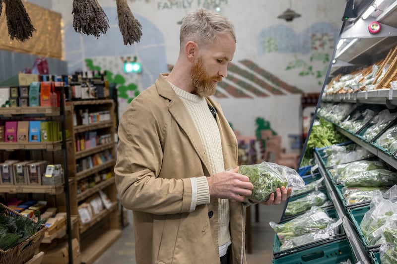 Library Street chef Kevin Burke looks at produce in the McNally Family Farm shop. Photograph: Chris Maddaloni/The Irish Times