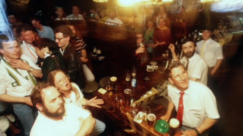 Ireland fans watch the game game against England in Toners Bar, Dublin. Photo: James Meehan/Inpho