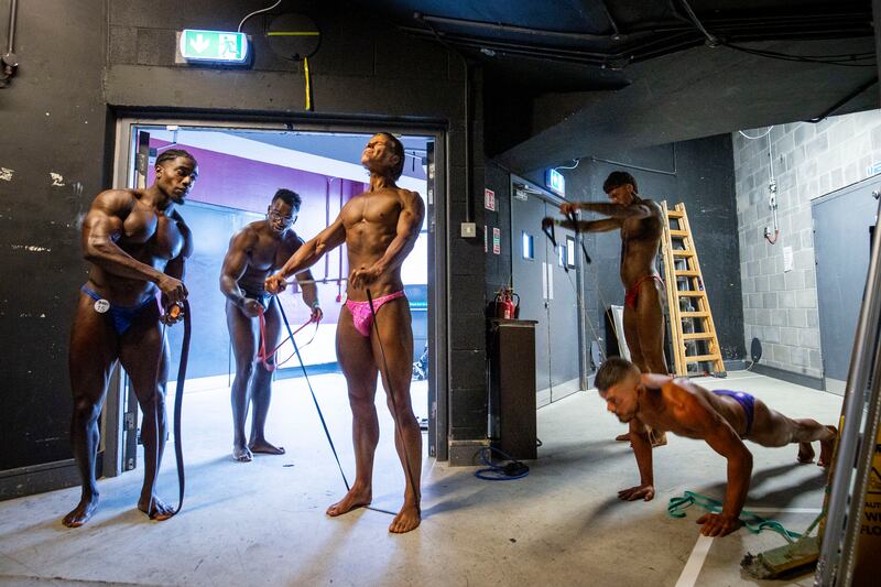 Competitors backstage before the Junior Men's Bodybuilding contest. Photograph: Tom Honan