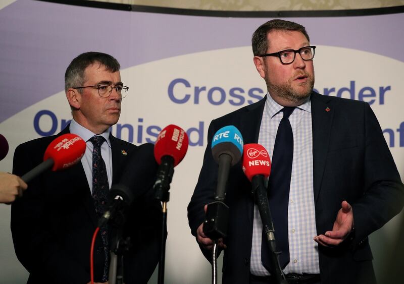 Garda Commissioner Drew Harris (left) and PSNI acting deputy chief constable Stephen Martin address the media during the cross-Border conference on organised crime Newcastle, Co. Down on November 7th Photograph: Brian Lawless/PA Wire