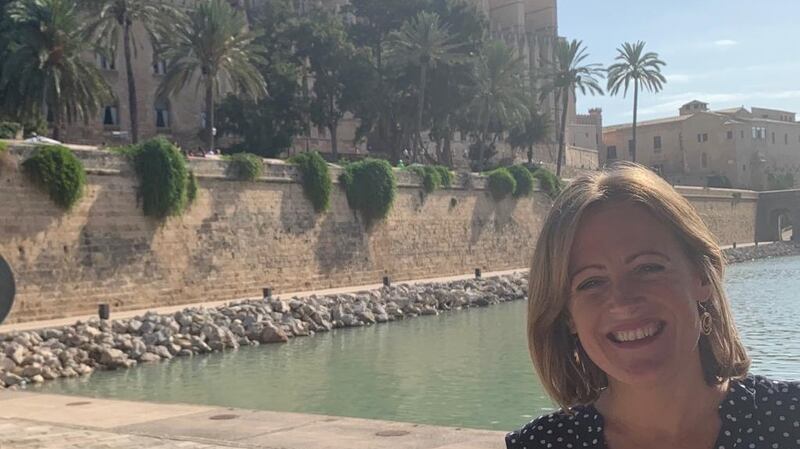 Liz Golden in Majorca, where she loves the sunny climate, the beaches, the lemon tree-laden mountains and the local cuisine.