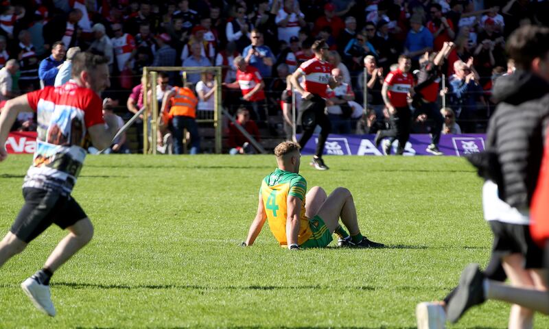 Donegal’s Stephen McMenamin dejected at the final whistle in the Ulster final. Photograph: Declan Roughan/Inpho
