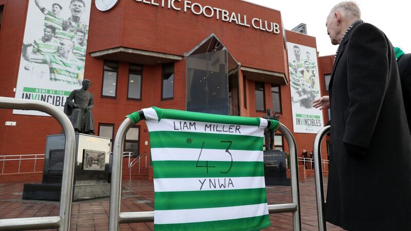 Tributes to Liam Miller outside Celtic Park ahead of the  Scottish Cup fifth-round match. Photograph:  Andrew Milligan/PA Wire
