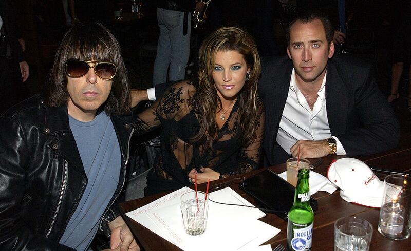 Johnny Ramone, Lisa Marie Presley and her then husband Nicolas Cage in New York City, 2001. Photograph: Larry Busacca/WireImage