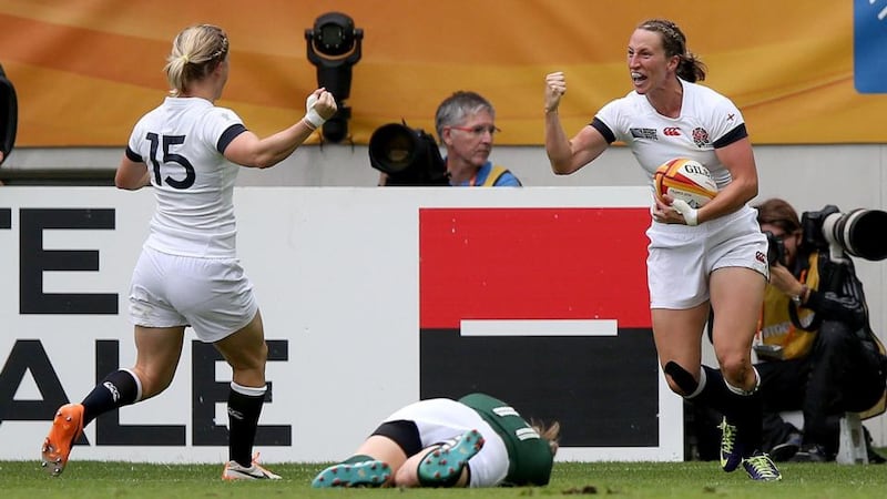 England’s Emily Scarratt celebrates her try with Danielle Waterman. Photograph: Dan Sheridan / Inpho