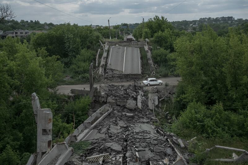 A destroyed bridge in Kupiansk, Ukraine, a town east of Kharkiv that Russians have subjected to relentless shelling since Ukrainian forces retook the area months ago. Photograph: Mauricio Lima/New York Times