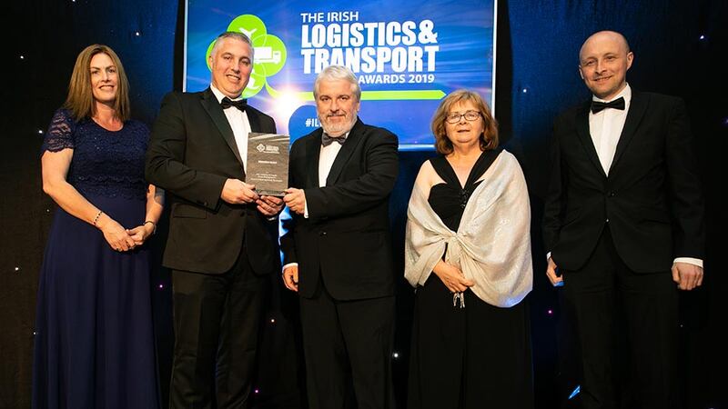 Aidan Flynn, Awards Judge presents the Education Award to the School of Management, TU Dublin team.