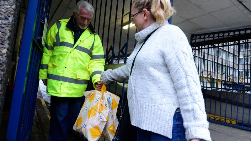 A caller with shopping for Apollo House, a vacant Dublin city centre office which homeless people have occupied. Photograph: Cyril Byrne