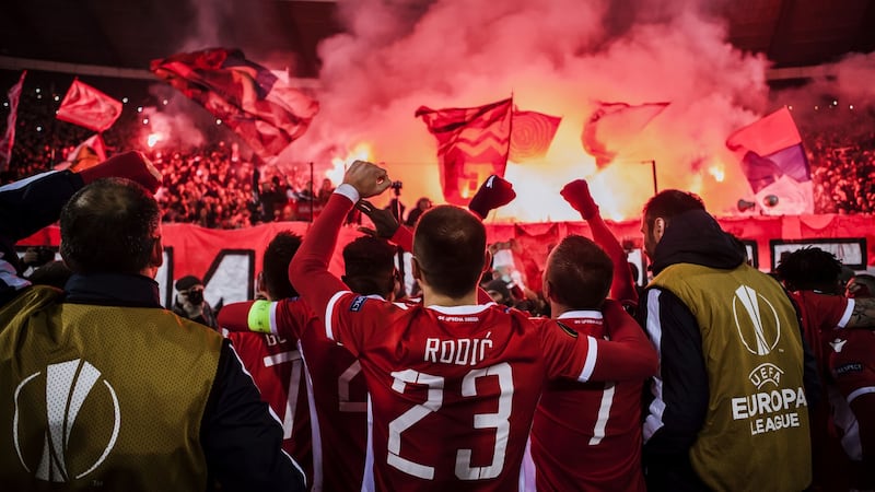 Red Star players celebrate with their fans after beating FC Cologne in the Europa League last year. Photo: Nikola Krstic/Action Plus via Getty Images