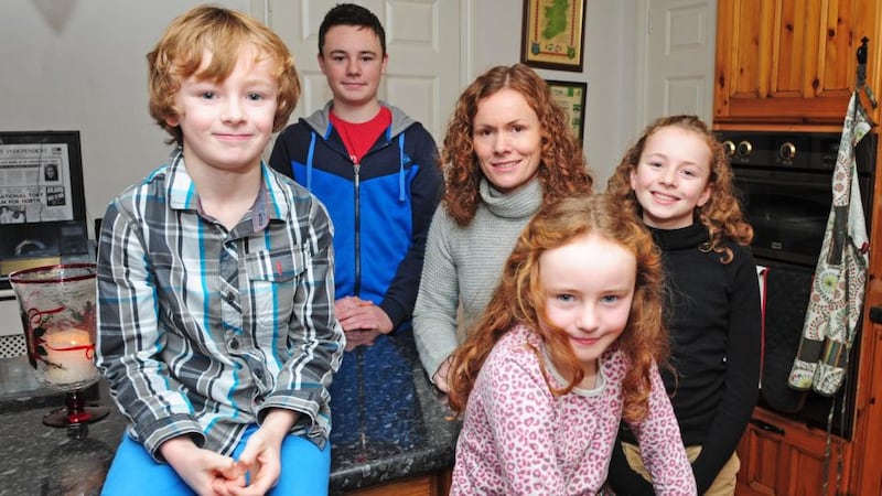 Emer Doyle and her children, from left, Peter (8), Sean (16), Mia (9) and Ellie (13), at their home in Kilcavan, Co Offaly. Photograph: James Flynn/APX