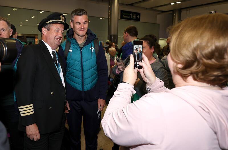Ireland’s Jonathan Sexton poses with an Aer Lingus pilot. Photograph: INPHO/Ben Brady