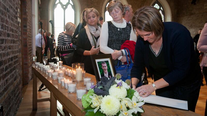 Patricia Gibbons  from Rahan,Tullamore, Co Offaly, with a photo of her husband James Gibbons at Smock Alley Theatre, Dublin. Photograph: Gareth Chaney/Collins