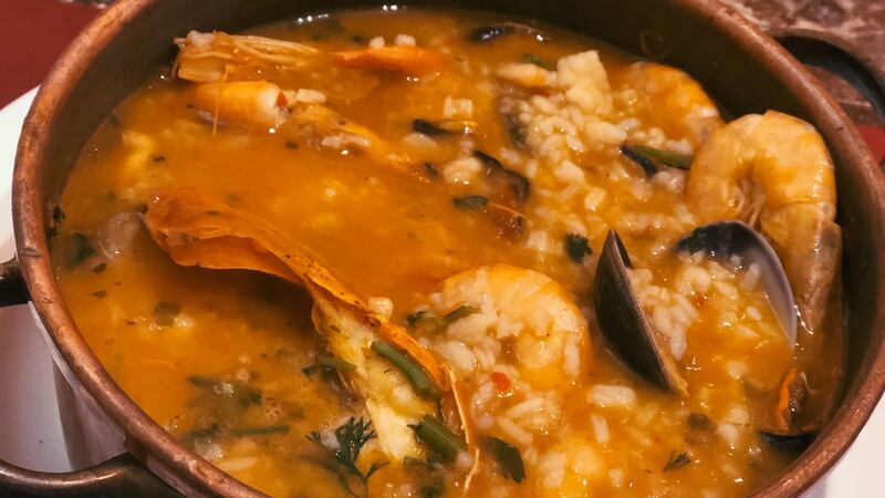 Seafood stew in traditional Portuguese copper cataplana. Photograph: Getty