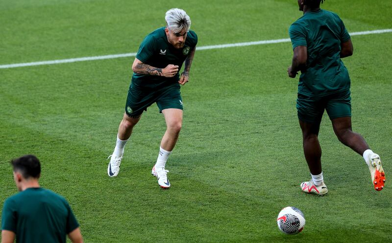 Aaron Connolly of Ireland training at the Parc des Princes ahead of the crunch Euro 2024 qualifier with France. Photograph: Ryan Byrne/INPHO