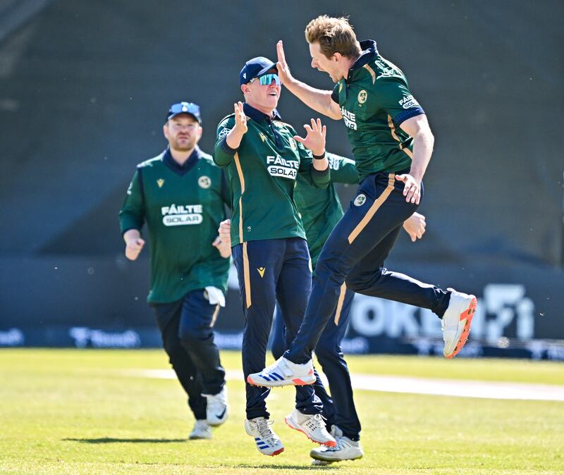 Ireland bowler Barry McCarthy (right) celebrates with team-mate Cade Carmichael after taking the wicket of West Indies' Brandon King of West Indies. Photograph: Sam Barnes/Sportsfile