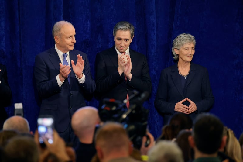Taoiseach Micheál Martin, Tánaiste Simon Harris join president-elect Catherine Connolly on stage for the election result. Photograph: Alan Betson