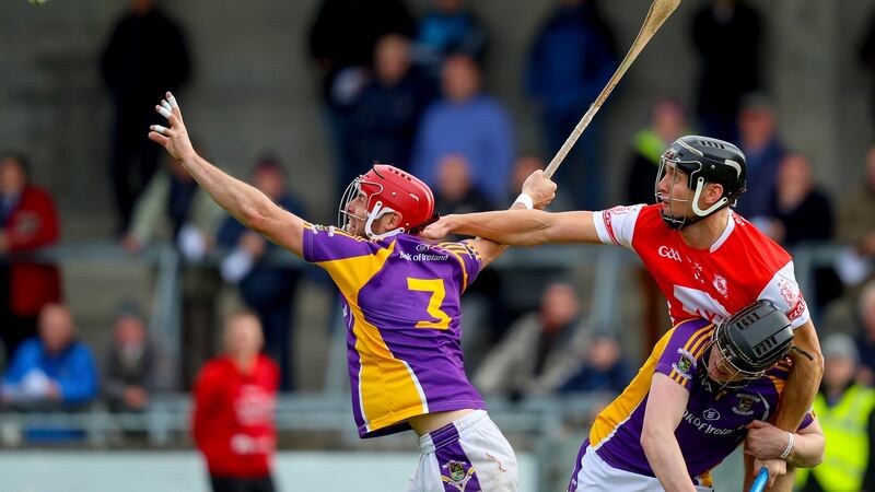 Kilmacud Crokes’ Bill O’Carroll and Cian MacGabhann battle against  Mark Schutte of Cuala during the semi-final win over the All-Ireland club champions. Photograph: Oisin Keniry/Inpho