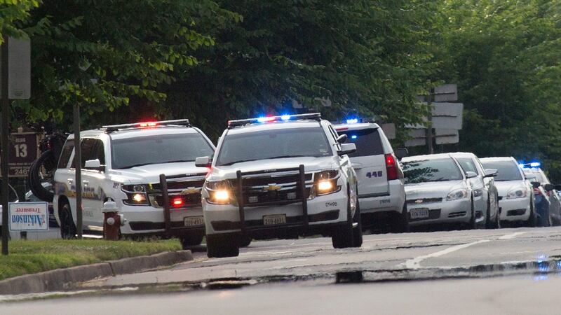 Police work the scene of a mass shooting at the Virginia Beach city public works building on Friday. Photograph: L. Todd Spencer/The Virginian-Pilot via AP