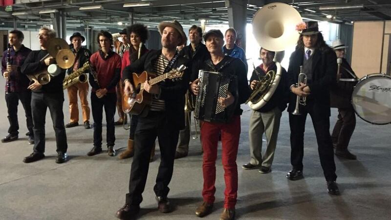 Irishman Paddy Sherlock (with guitar) and  band about to play at the funeral of Charlie Hebdo editor Stéphan Charbonnier (Charb) on Friday, January 16th, 2015.  Photograph: Thomas Ohrasser
