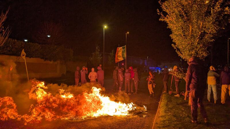 Protesters in Saggart, as disturbances have flared outside Citywest Hotel. Photograph: Cillian Sherlock/PA Wire