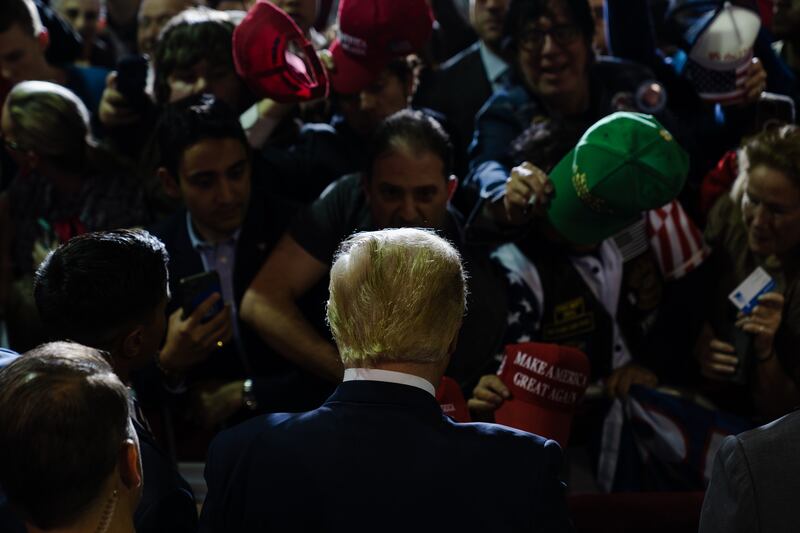 Trump greets supporters at a rally in Manchester, New Hampshire, in April. Photograph: Sophie Park/The New York Times
                      