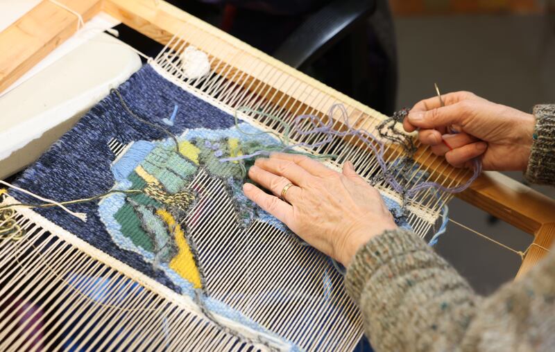 Mary Fitzgerald at work with the Liberties Weavers. Photograph: Dara Mac Donaill/The Irish Times