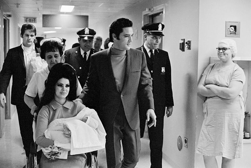 Priscilla and Elvis Presley leave hospital in July 1968 with a newborn Lisa Marie. Photograph: Bettmann Archive/Getty Images