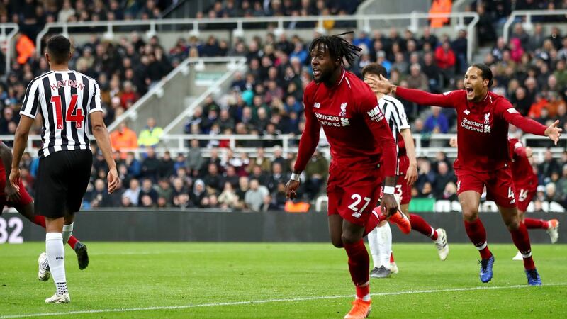 Liverpool’s Divock Origi celebrates after scoring the winner against Newcastle United at St James’s Park. Photograph: Clive Brunskill/Getty Images