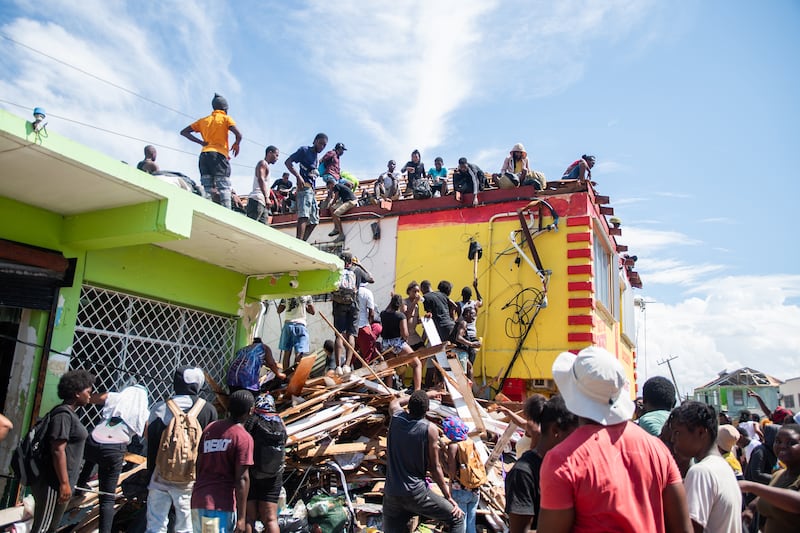 People at a market looking for supplies in Black River, Jamaica, on Thursday. Photograph: Photograph: New York Times
                      