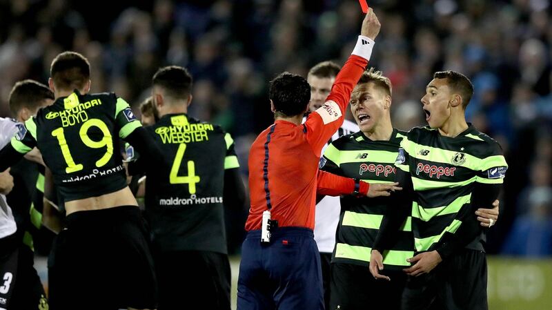 Shamrock  Rovers’ Graham Burke is shown a straight red card by referee Neil Doyle. Photograph: Ryan Byrne/Inpho