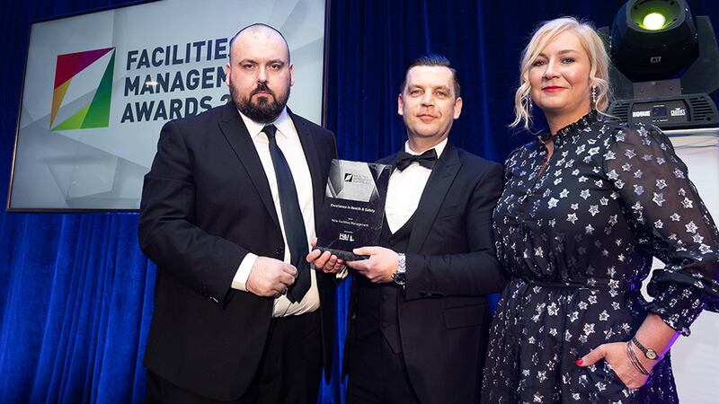 Kieron Millar, Managing Director, H&J Martin, presents the Excellence in Health & Safety Award to Patrick Mahon & Úna Gallagher, Mitie Facilities Management.