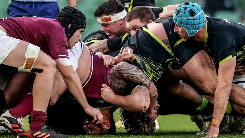 Ireland loosehead Finley Bealham and Georgia tighthead  Beka Gigashvili both hit the deck during a scrum. Photograph: Dan Sheridan/Inpho