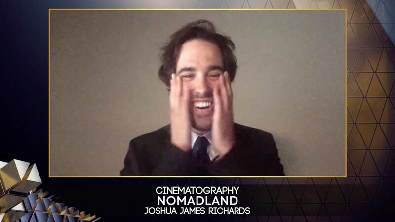 Joshua James Richards reacting after winning the Bafta for Cinematography for his work on the film ‘Nomadland’. Photograph:  Laurence Griffiths/Bafta/AFP via Getty Images)