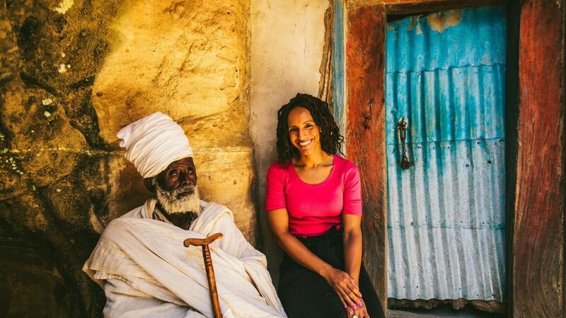 African Renaissance: When Art Meets Power: Afua Hirsch with Church elder Melake Genet Adhana outside the Church of Yohannes in Maequdi, Ethiopia. Photographer: Alex Brisland