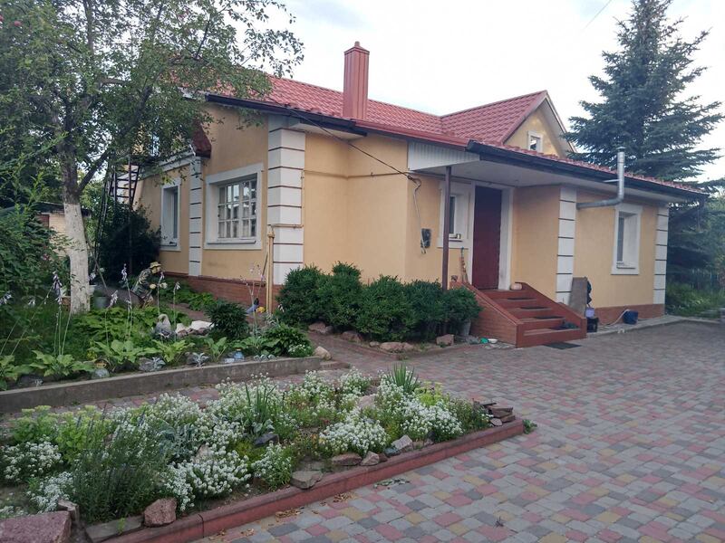The Kizilov family's home in Bucha outside Kyiv. Valeriy Kizilov was killed and the house destroyed during Russia's occupation a year ago. Photographs courtesy of Yevhen Kizilov
