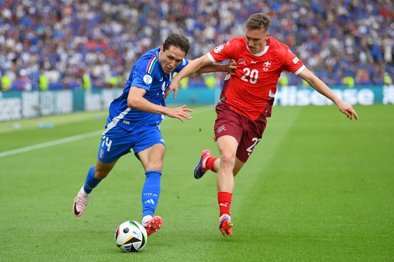 Federico Chiesa in action against Michel Aebischer of Switzerland during Euro 2024 clash in Berlin. Photograph: Justin Setterfield/Getty Images