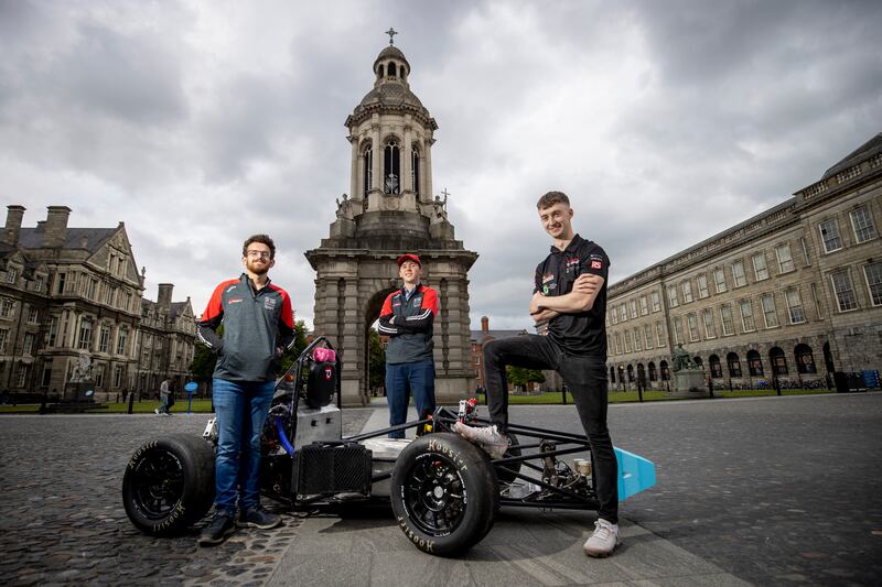 Formula Trinity team members Padraig McDermott, Aidan McNeill and Michael Morgan alongside vehicle Bertie. Photograph: Tom Honan